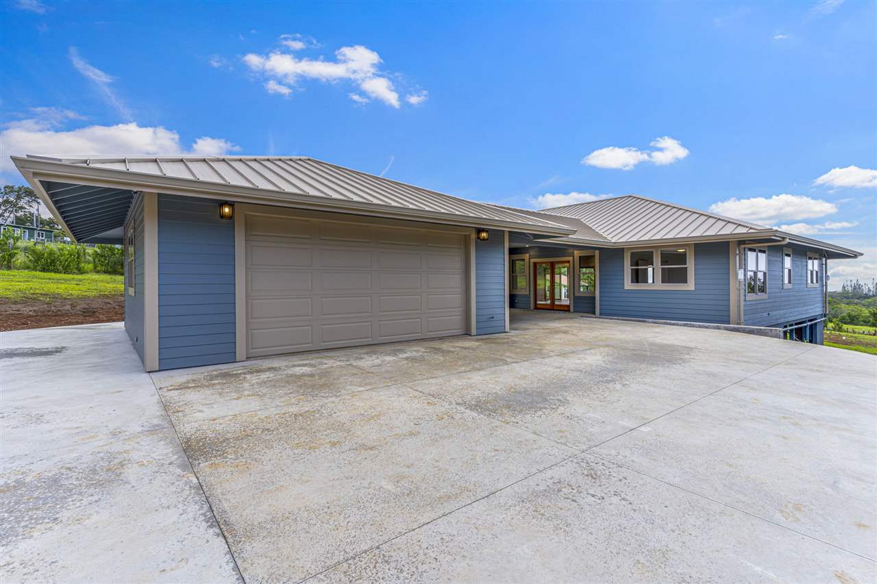 780 West Kuiaha Road Haiku, HI 96708 - Photo 6 of 30 a view of a house with a patio and a yard