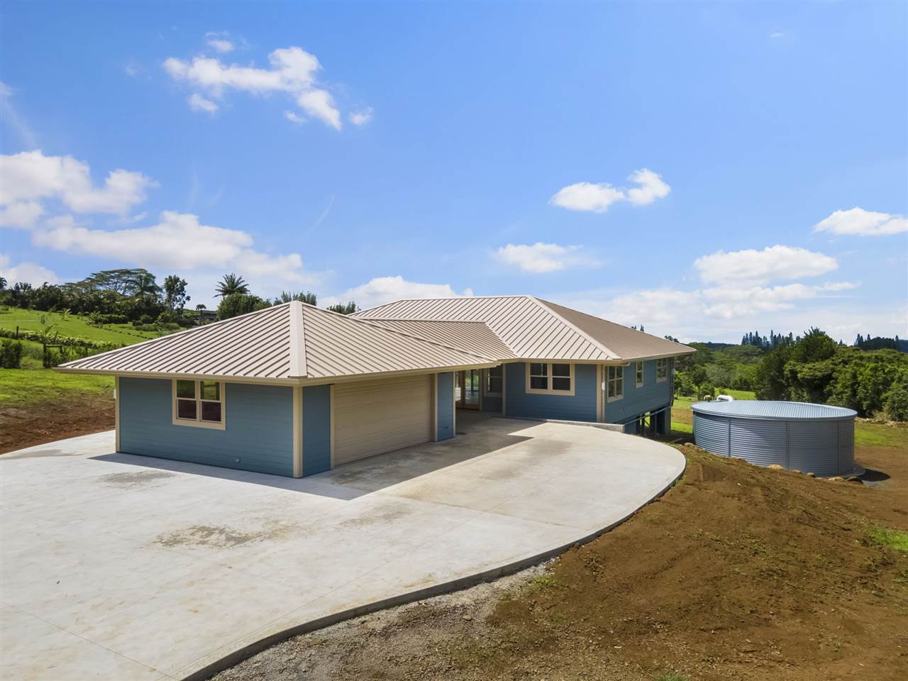 780 West Kuiaha Road Haiku, HI 96708 - Photo 9 of 30 a house with a yard