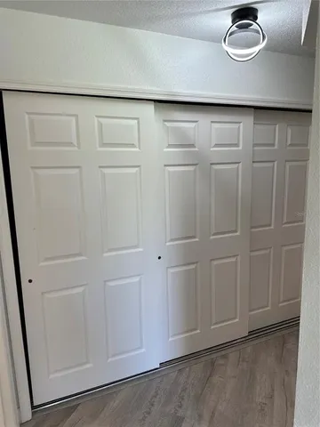 a close view of cabinet with washer and dryer