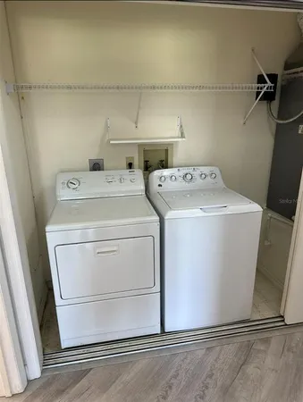 a utility room with dryer and washer