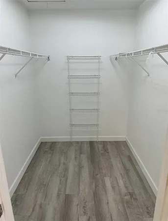 a view of a room with racks on the wall