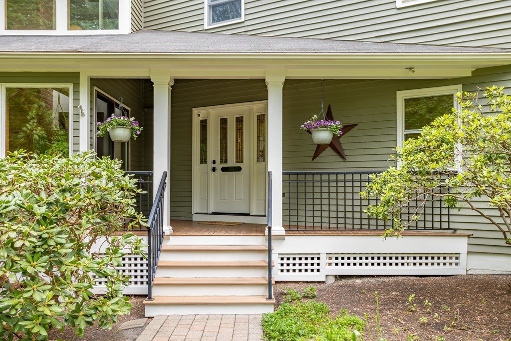 153 Green Road Bolton, MA 01740 - Photo 2 of 42 a front view of a house