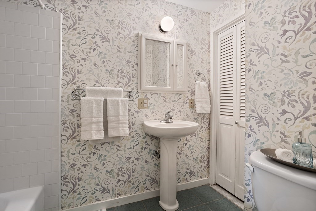 153 Green Road Bolton, MA 01740 - Photo 34 of 42 a bathroom with a sink and a mirror