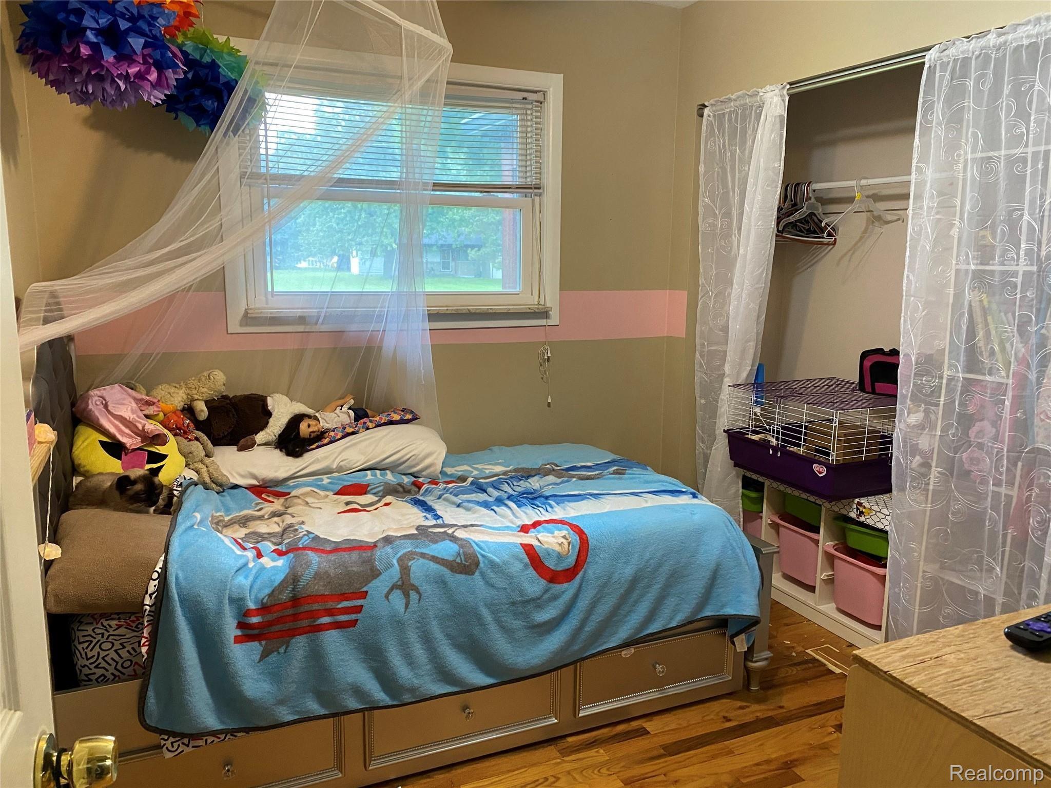 13343 Jennings Road Linden, MI 48451 - Photo 16 of 31 Bedroom With Hard Wood Flooring!