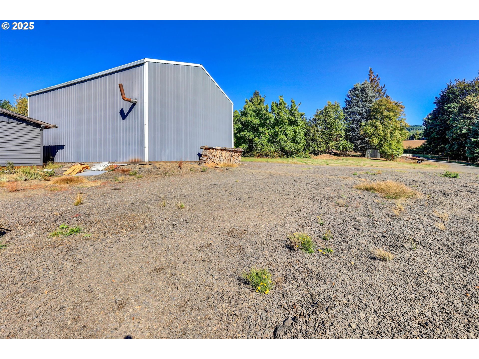 21076 Northwest Green Mountain Road Banks, OR 97106 - Photo 15 of 46 a view of a backyard of a house