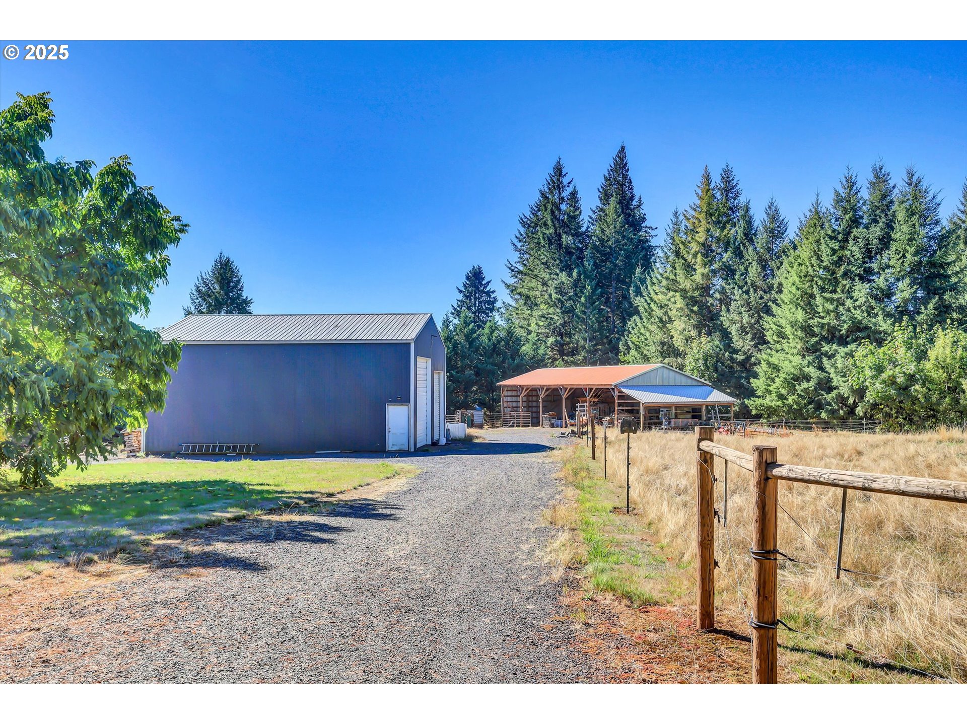 21076 Northwest Green Mountain Road Banks, OR 97106 - Photo 17 of 46 a view of a backyard with a house