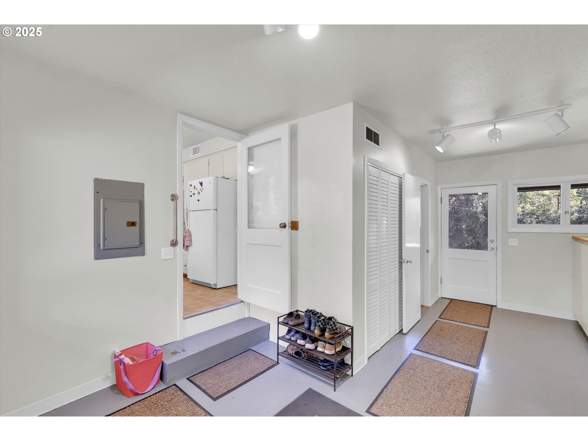 21076 Northwest Green Mountain Road Banks, OR 97106 - Photo 39 of 46 a living room with furniture and a rug