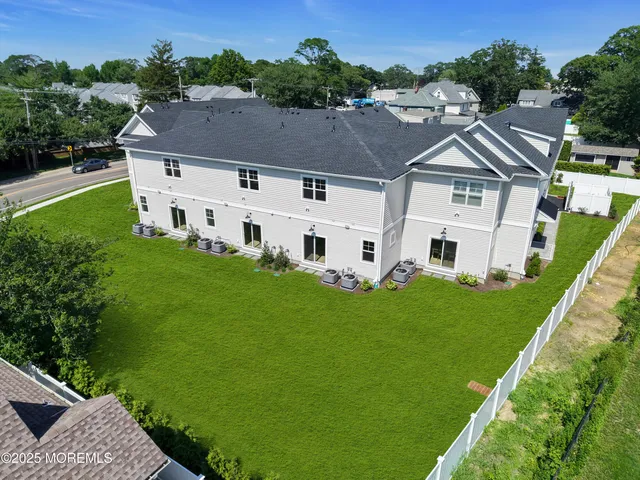 a aerial view of a house with garden