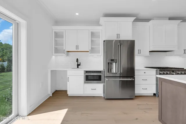 a view of a hallway with staircase