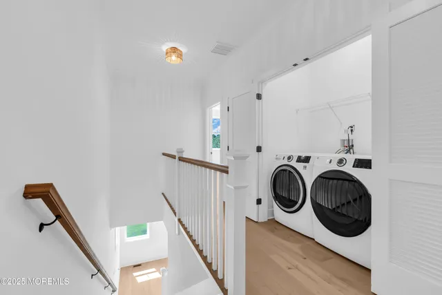 a bathroom with a granite countertop sink a toilet and a bathtub