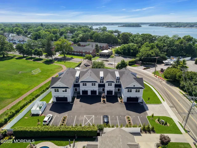a view of yard with swimming pool and outdoor seating
