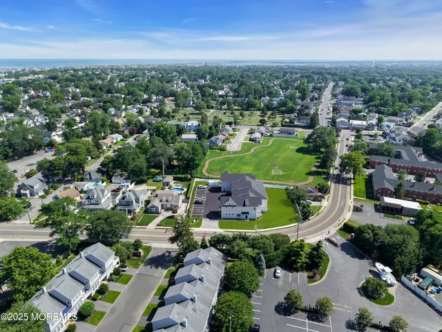 a view of a city with an ocean view
