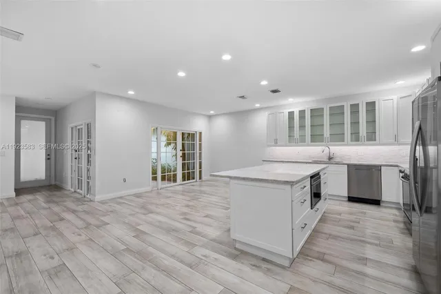 a bathroom with a sink toilet and vanity