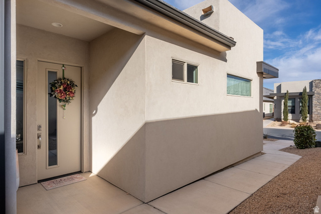 4708 Martin Drive St. George, UT 84790 - Photo 4 of 28 View of exterior entry with stucco siding