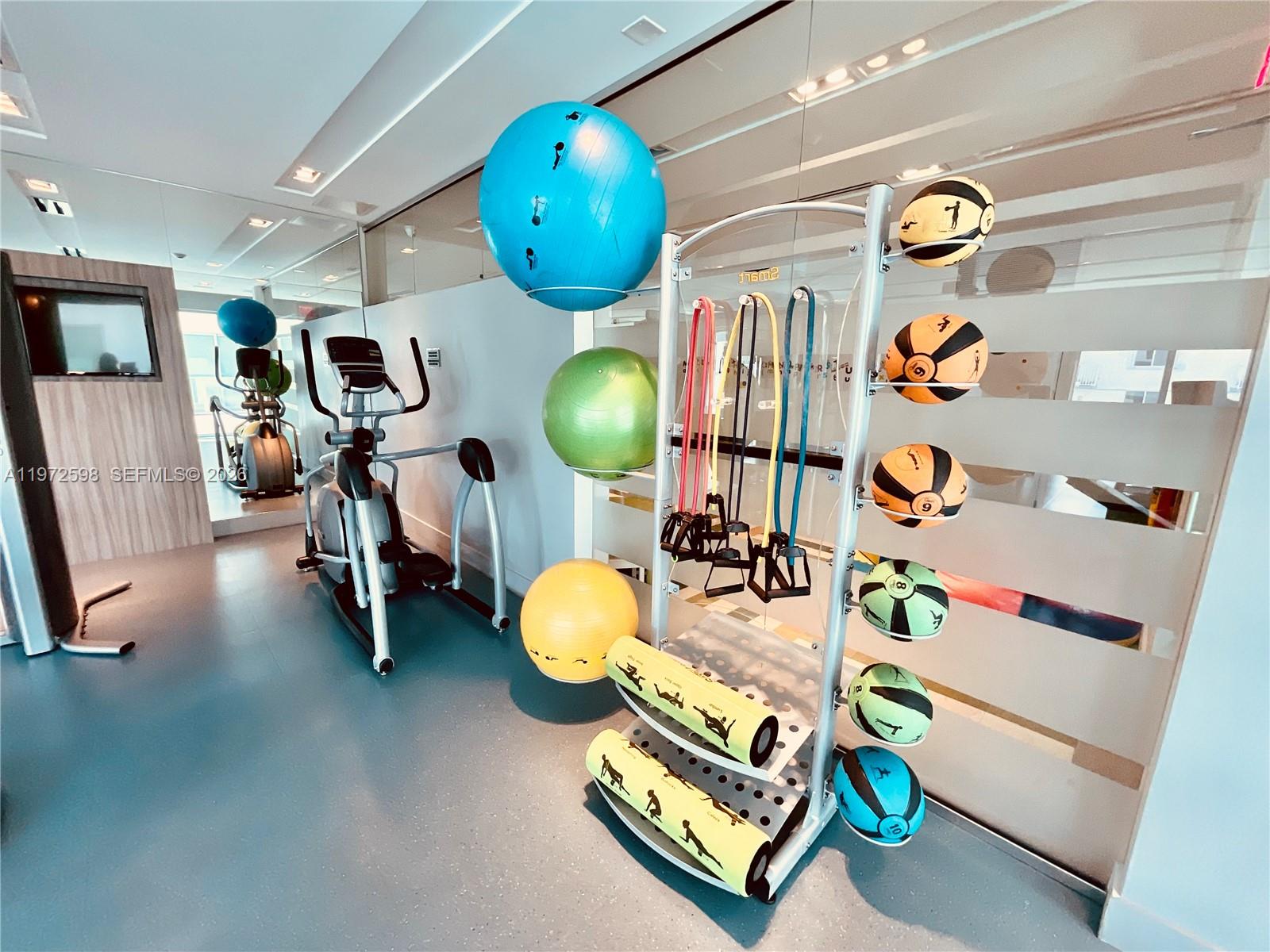1600 Southwest 1st Avenue, Unit 1204 Miami, FL 33129 - Photo 14 of 75 a view of a room with gym equipment