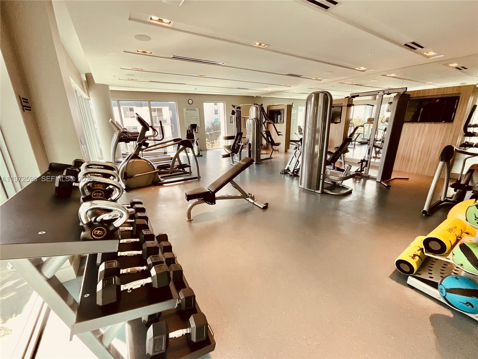 1600 Southwest 1st Avenue, Unit 1204 Miami, FL 33129 - Photo 20 of 75 a room with gym equipment