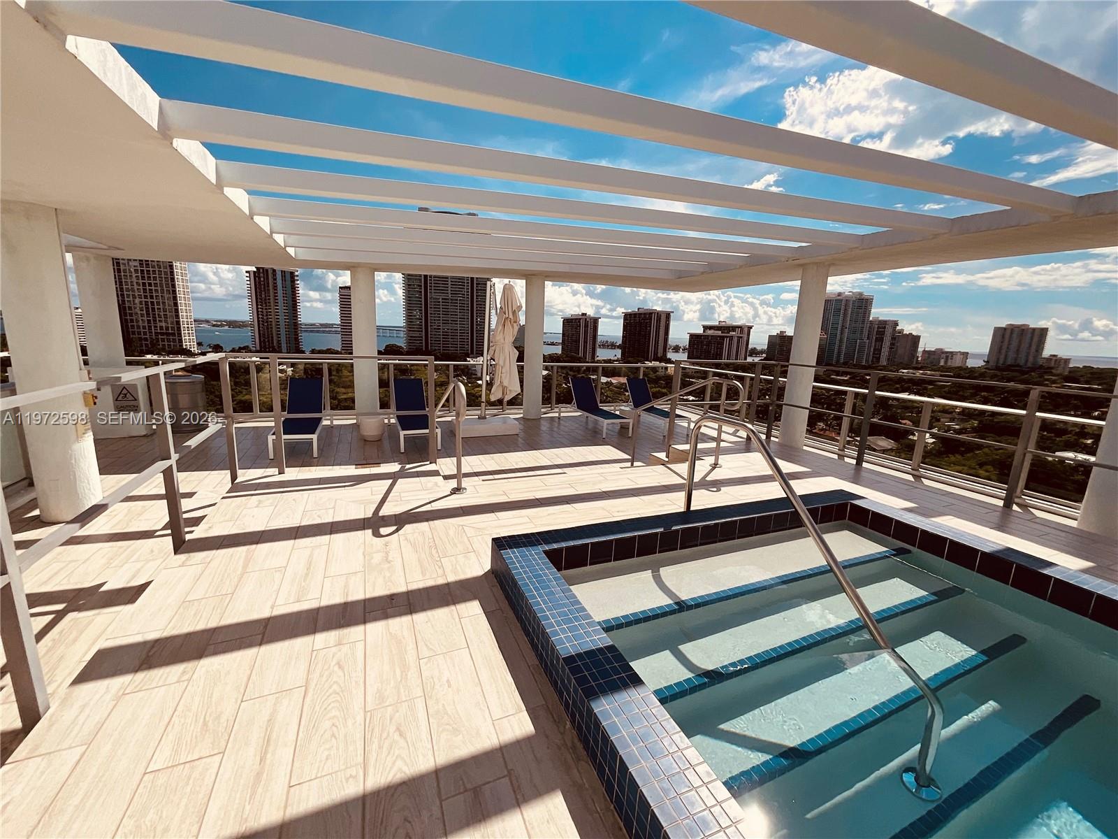 1600 Southwest 1st Avenue, Unit 1204 Miami, FL 33129 - Photo 33 of 75 a view of a living room with kitchen
