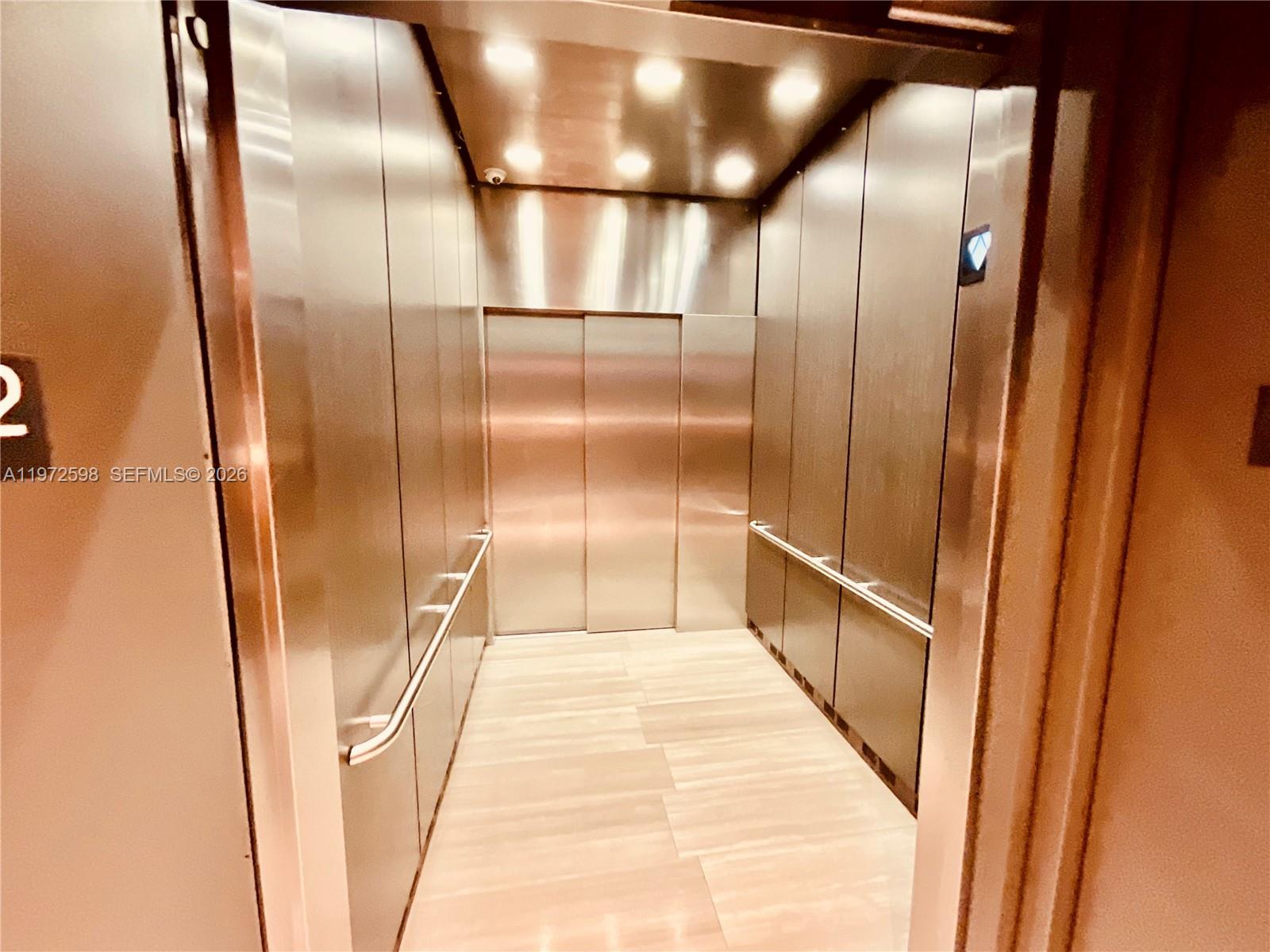 1600 Southwest 1st Avenue, Unit 1204 Miami, FL 33129 - Photo 44 of 75 a bathroom with a glass door shower