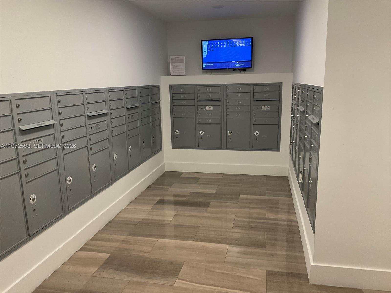 1600 Southwest 1st Avenue, Unit 1204 Miami, FL 33129 - Photo 47 of 75 a view of a hallway with wooden floor