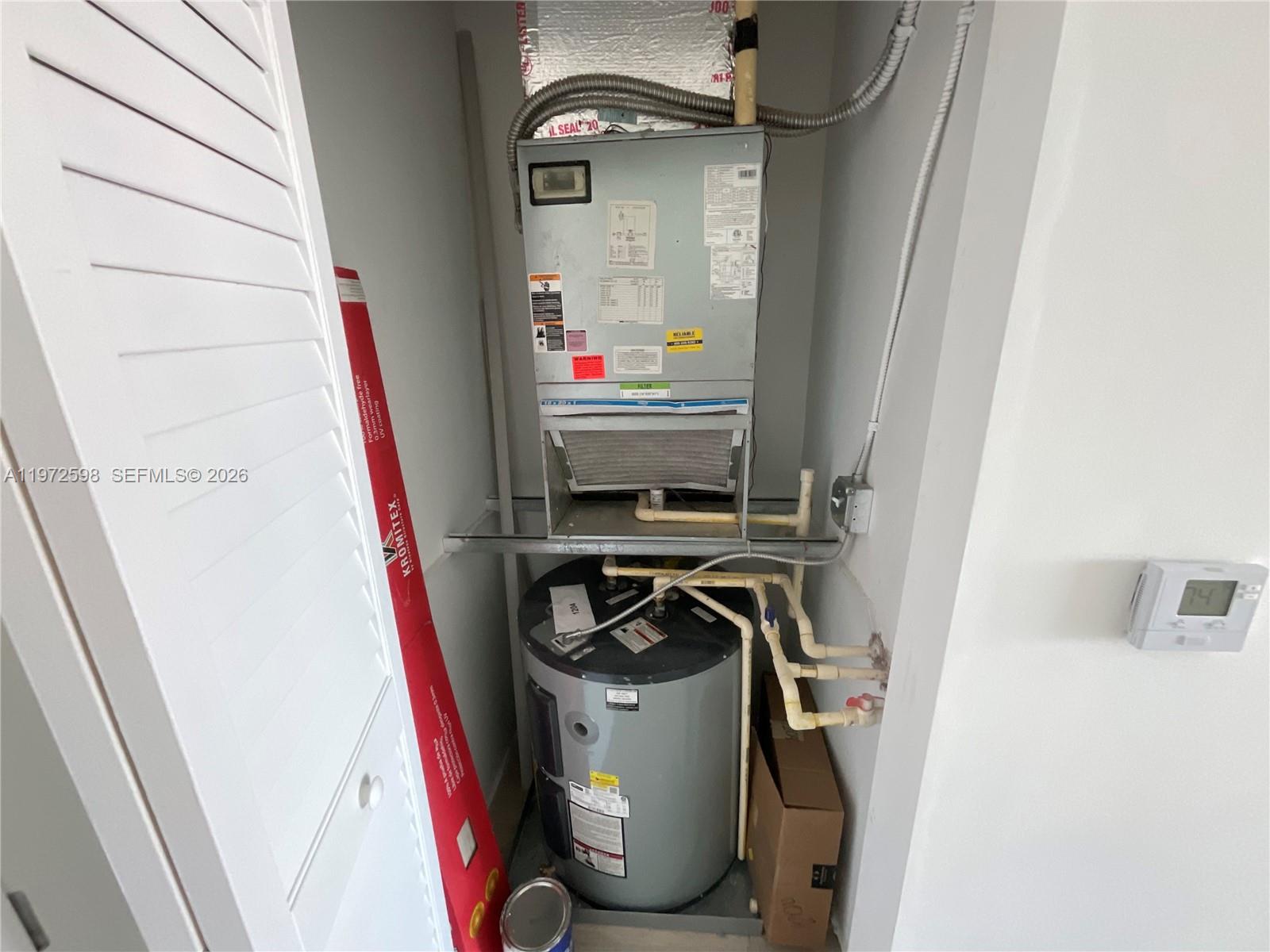 1600 Southwest 1st Avenue, Unit 1204 Miami, FL 33129 - Photo 69 of 75 AC and Water Heater closet
