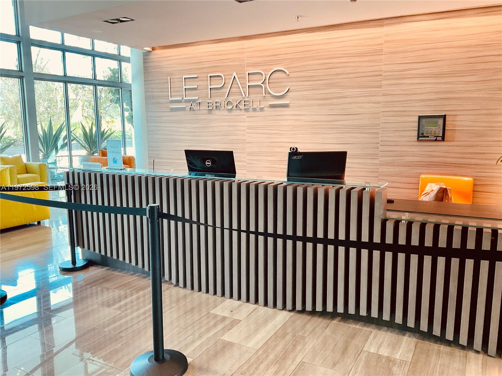 1600 Southwest 1st Avenue, Unit 1204 Miami, FL 33129 - Photo 9 of 75 a view of a brick wall with floor to ceiling windows