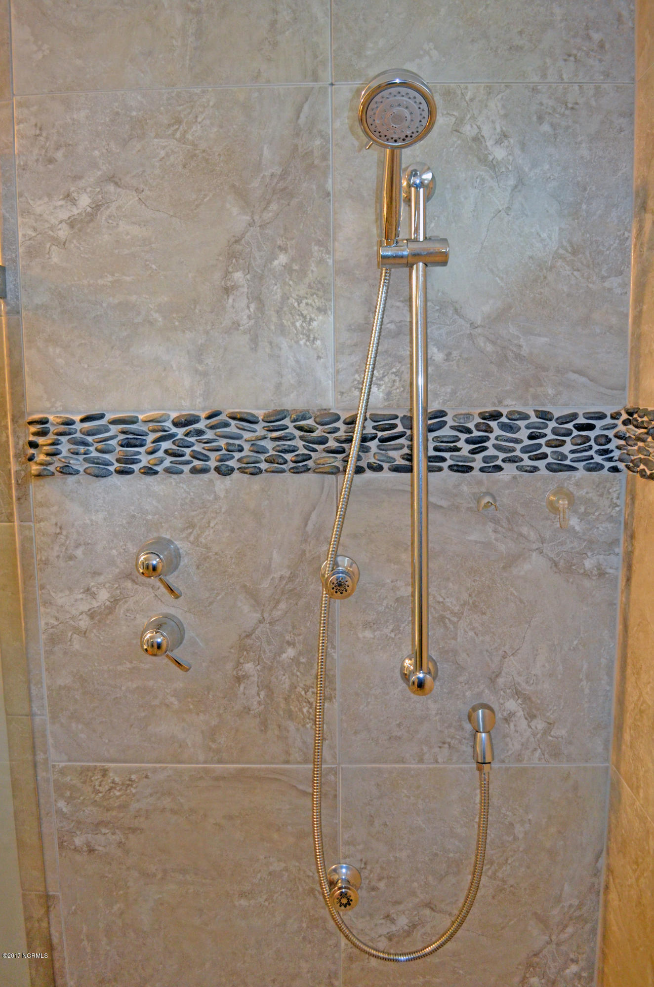 6131 Tarin Road Wilmington, NC 28409 - Photo 27 of 53 6131showerheads