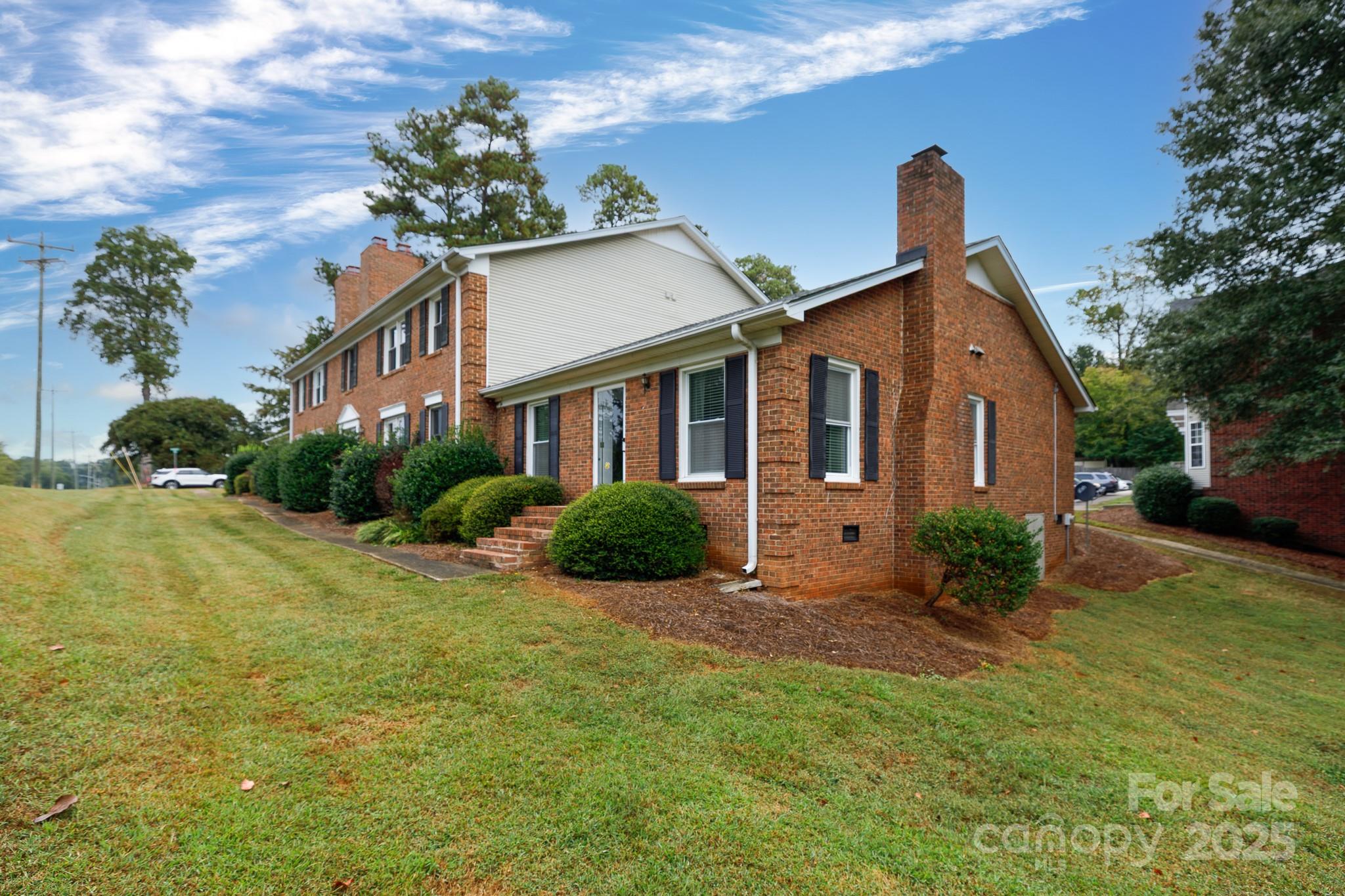 1246 India Hook Road Rock Hill, SC 29732 - Photo 2 of 21 a front view of a house with garden