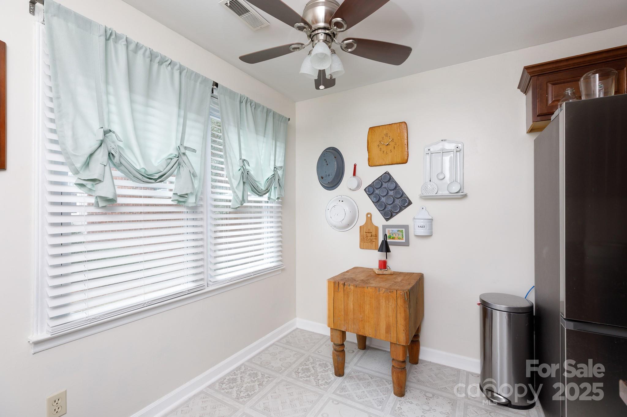 1246 India Hook Road Rock Hill, SC 29732 - Photo 10 of 21 a bedroom with a window and a chandelier
