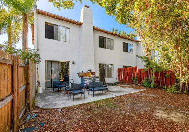 a view of a big room with closet and mirror