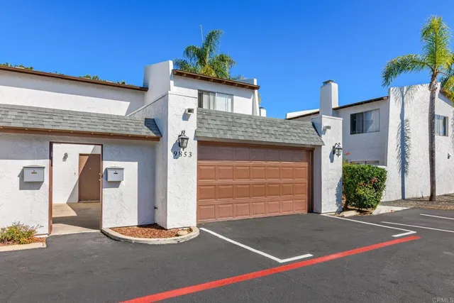 a view of an empty room with stairs