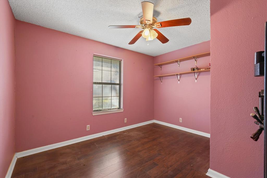 531 Private Road 4721 Rhome, TX 76078 - Photo 14 of 20 an empty room with a window