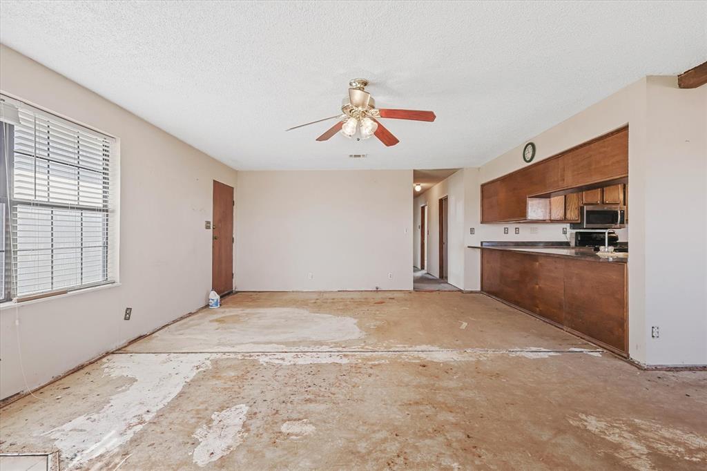531 Private Road 4721 Rhome, TX 76078 - Photo 7 of 20 a view of a kitchen with a sink and a kitchen view