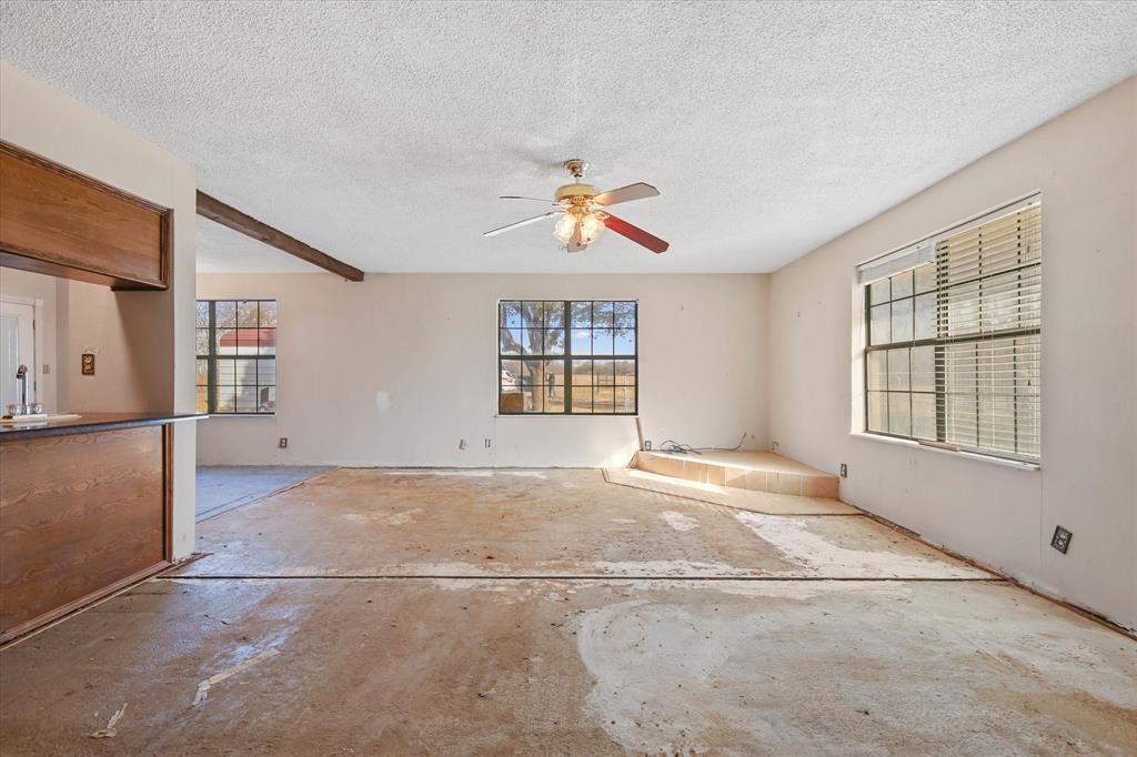 531 Private Road 4721 Rhome, TX 76078 - Photo 8 of 20 a view of an empty room with a window