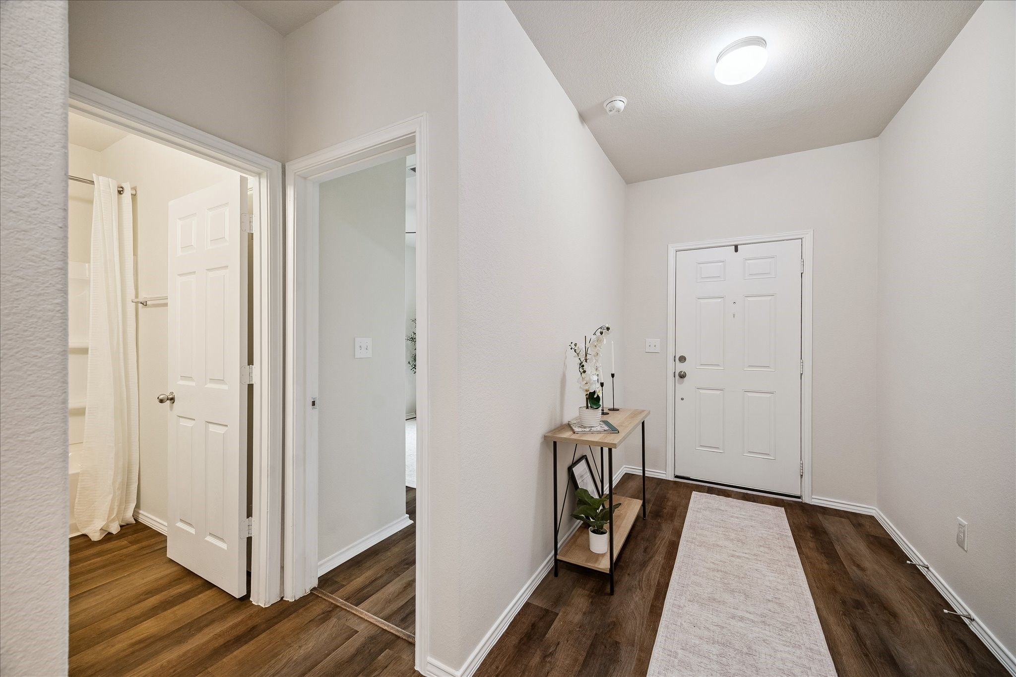 4275 Pine Still Road Conroe, TX 77304 - Photo 20 of 25 Charming entryway - View of 4th bedroom and 3rd full bathroom