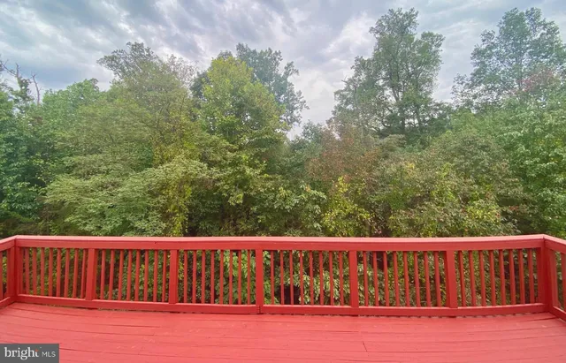 a view of a wooden fence