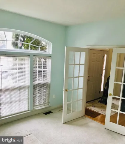 an empty room with windows