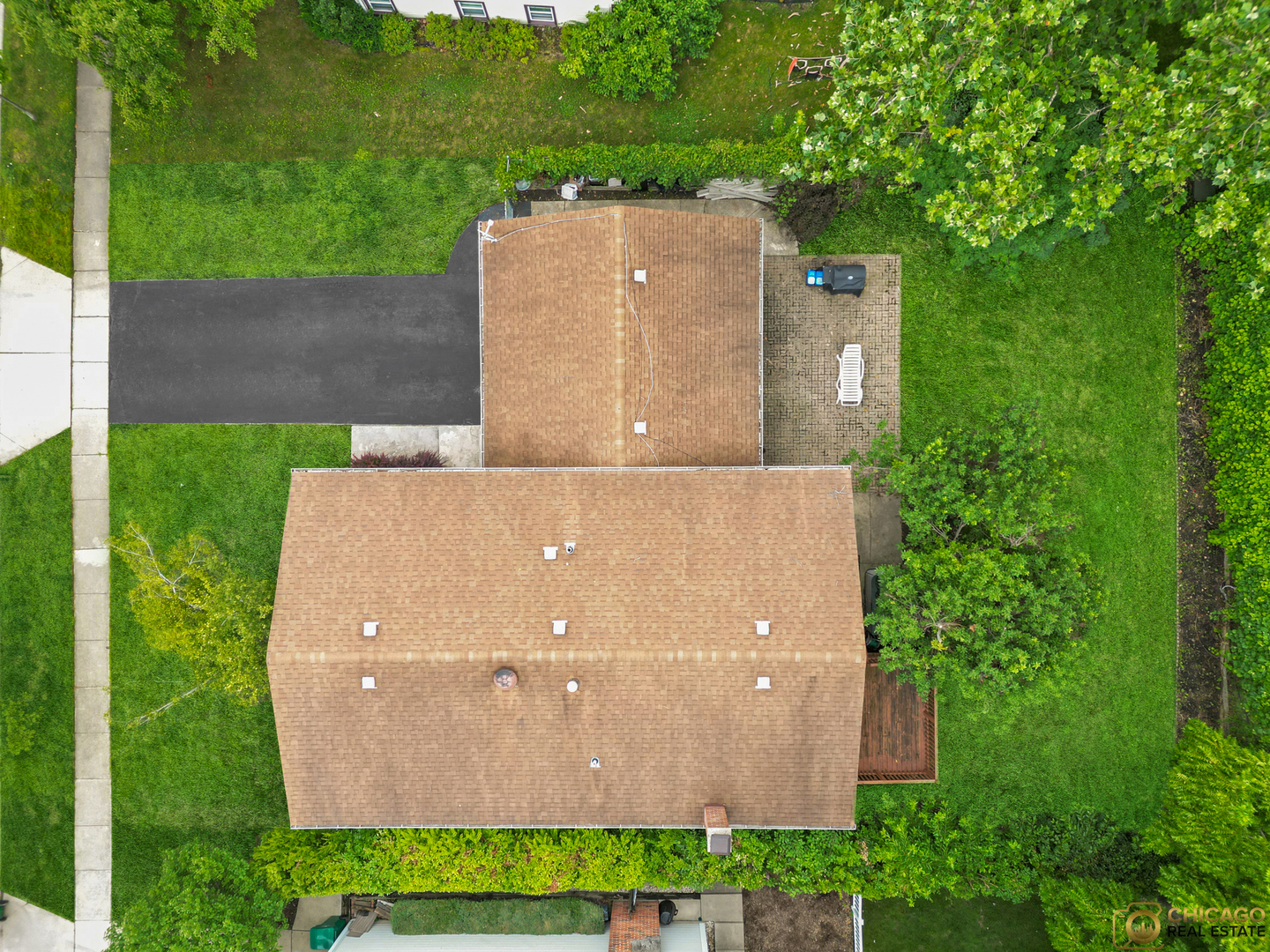 220 Osage Terrace Buffalo Grove, IL 60089 - Photo 15 of 24 an aerial view of a house with a yard and a large tree