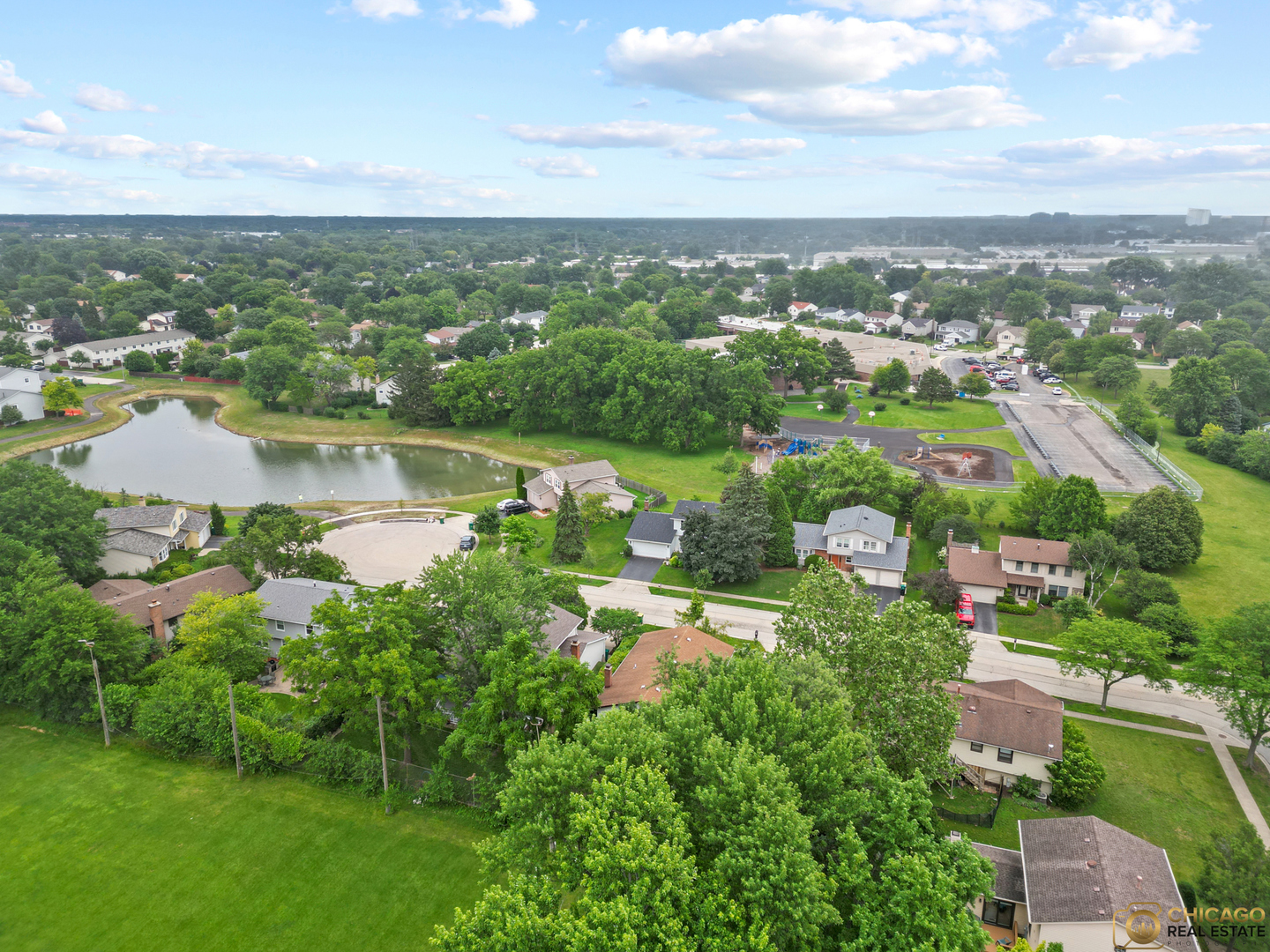 220 Osage Terrace Buffalo Grove, IL 60089 - Photo 22 of 24 an aerial view of a city with lots of residential buildings lake and ocean view