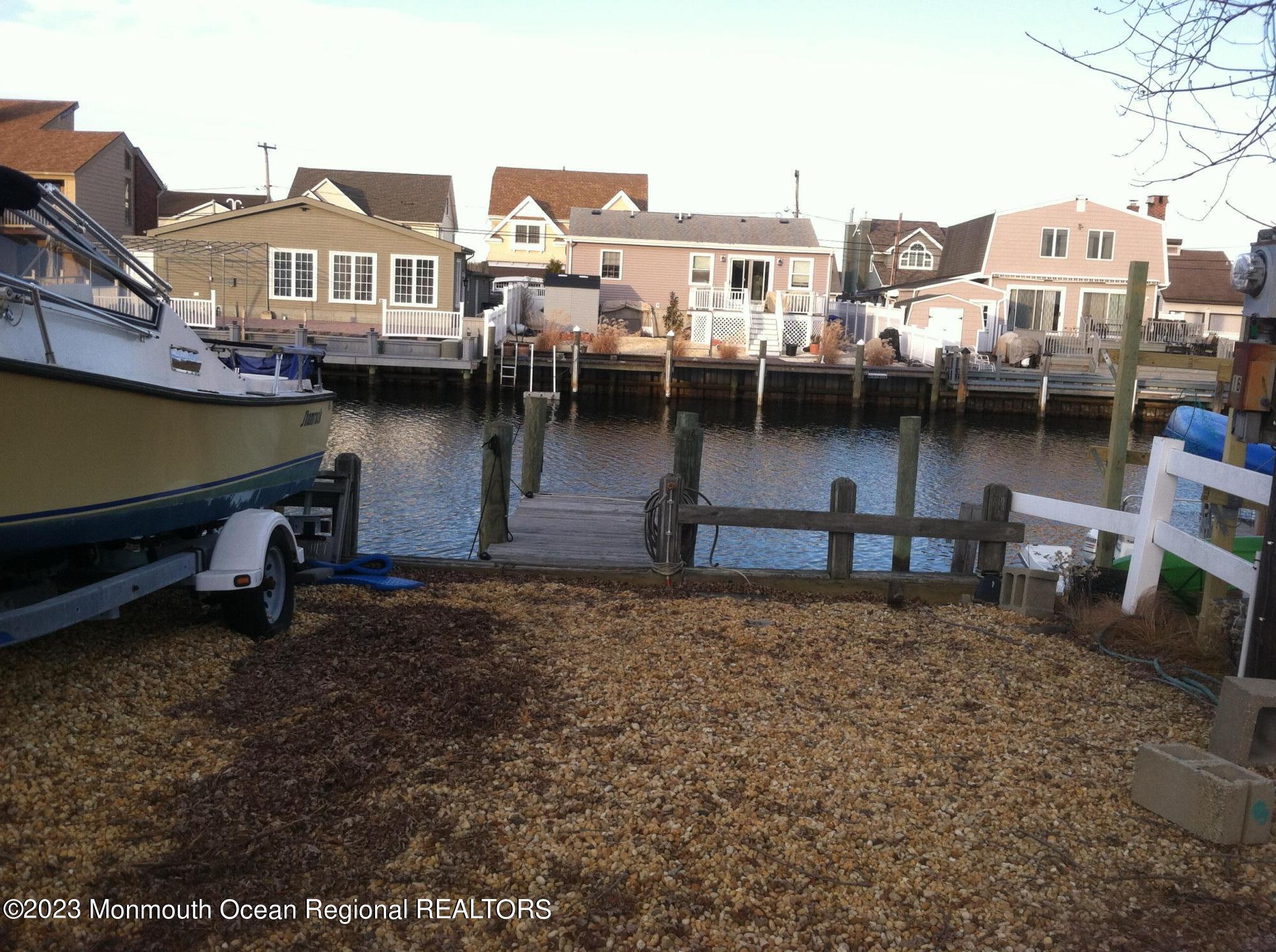 0 Topsail Road Brick, NJ 08723 - Photo 1 of 6 a view of a lake with buildings