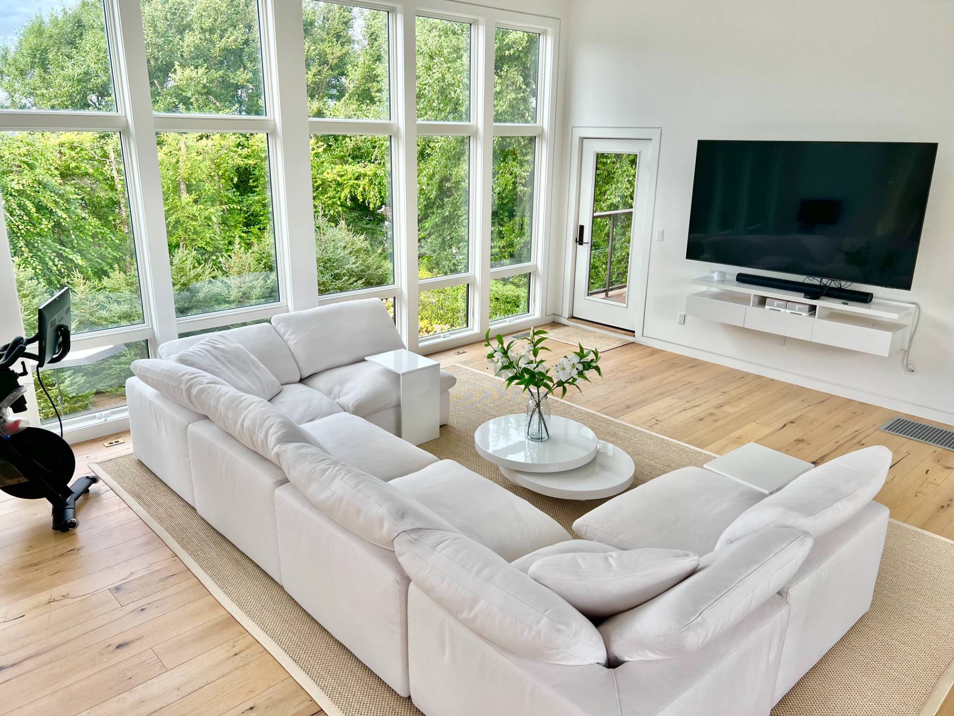 2 Captain Kidds Path Montauk, NY 11954 - Photo 4 of 15 a living room with furniture and a flat screen tv