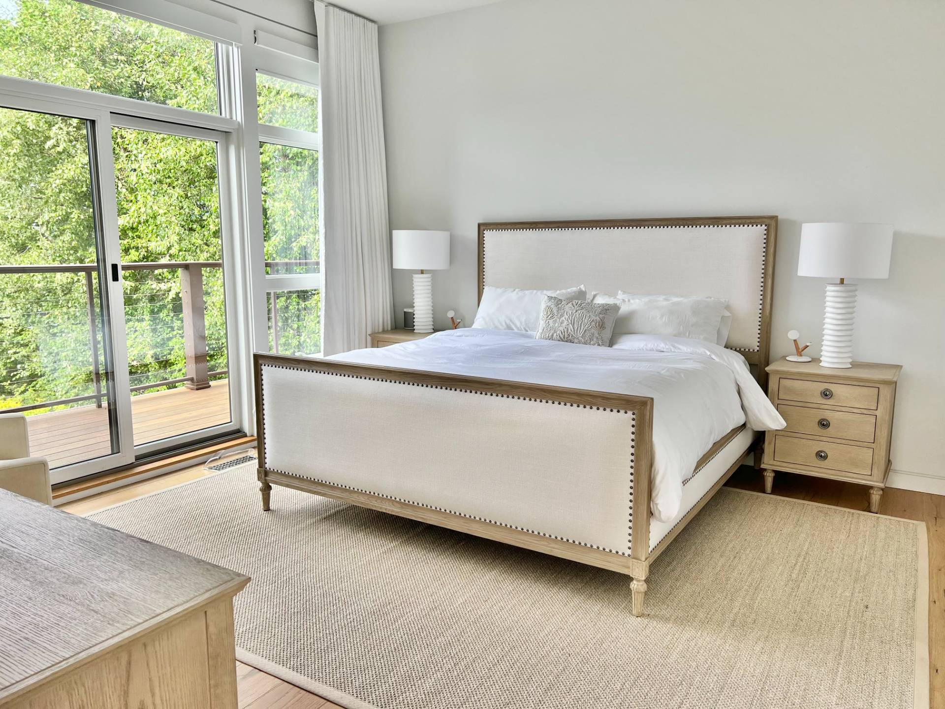 2 Captain Kidds Path Montauk, NY 11954 - Photo 6 of 15 a bedroom with a bed and a large window