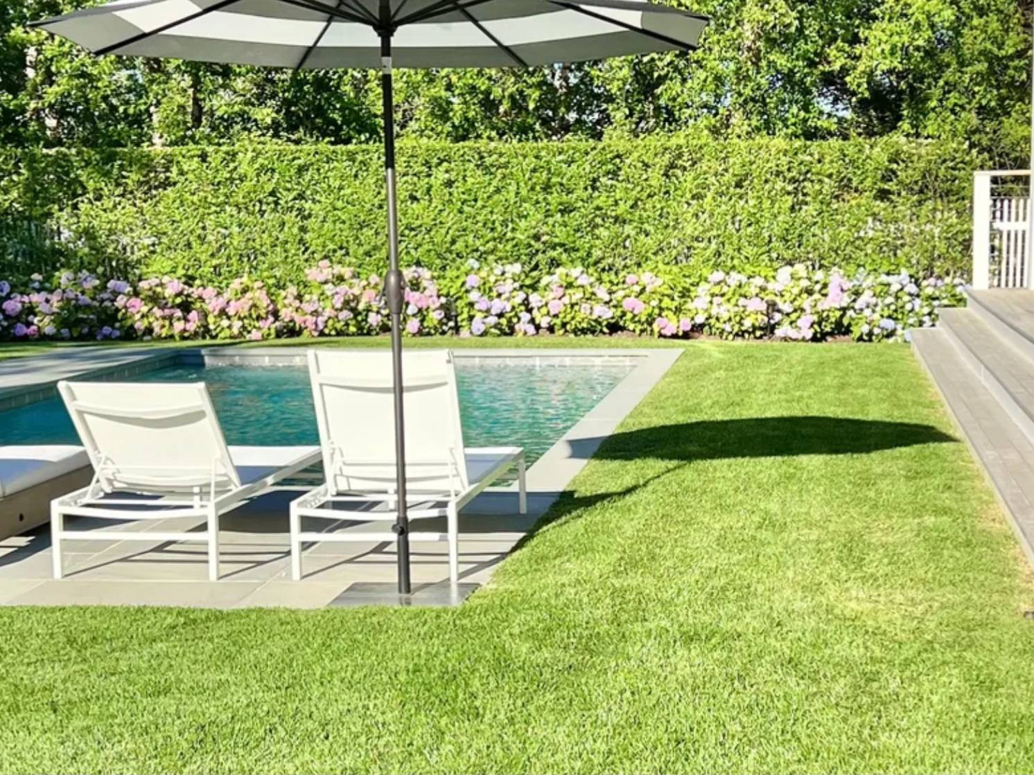 2 Captain Kidds Path Montauk, NY 11954 - Photo 9 of 15 a view of a chairs and table in the garden