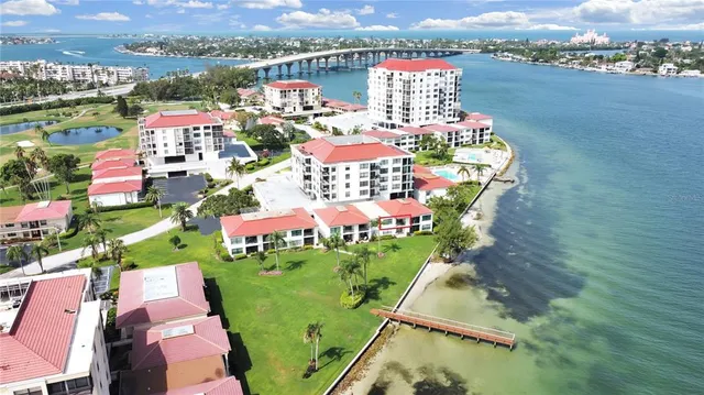 an aerial view of a houses with outdoor space