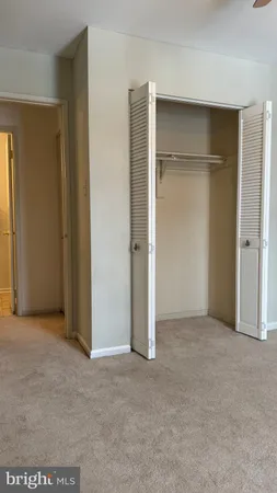 an empty room with closet