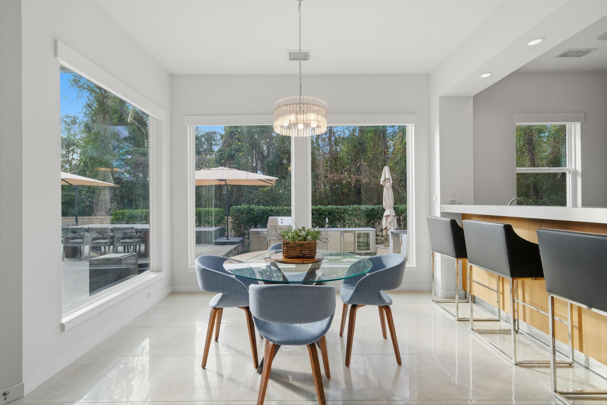 3 Farington Way The Woodlands, TX 77382 - Photo 16 of 49 a dining room with furniture window and outside view