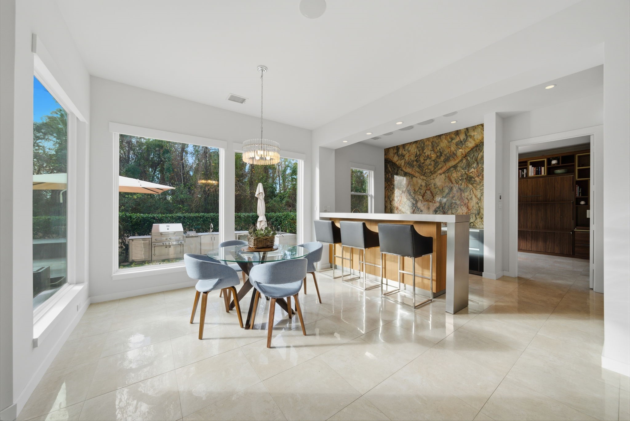 3 Farington Way The Woodlands, TX 77382 - Photo 17 of 49 a living room with furniture and a large window