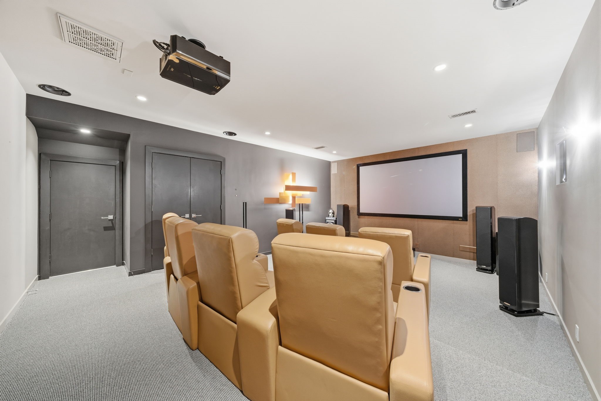 3 Farington Way The Woodlands, TX 77382 - Photo 37 of 49 a living room with furniture and a flat screen tv