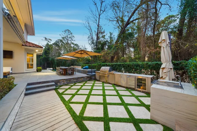 a view of swimming pool with outdoor seating
