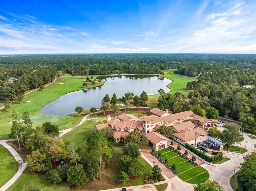 3 Farington Way The Woodlands, TX 77382 - Photo 46 of 49 an aerial view of lake residential house with outdoor space and trees around