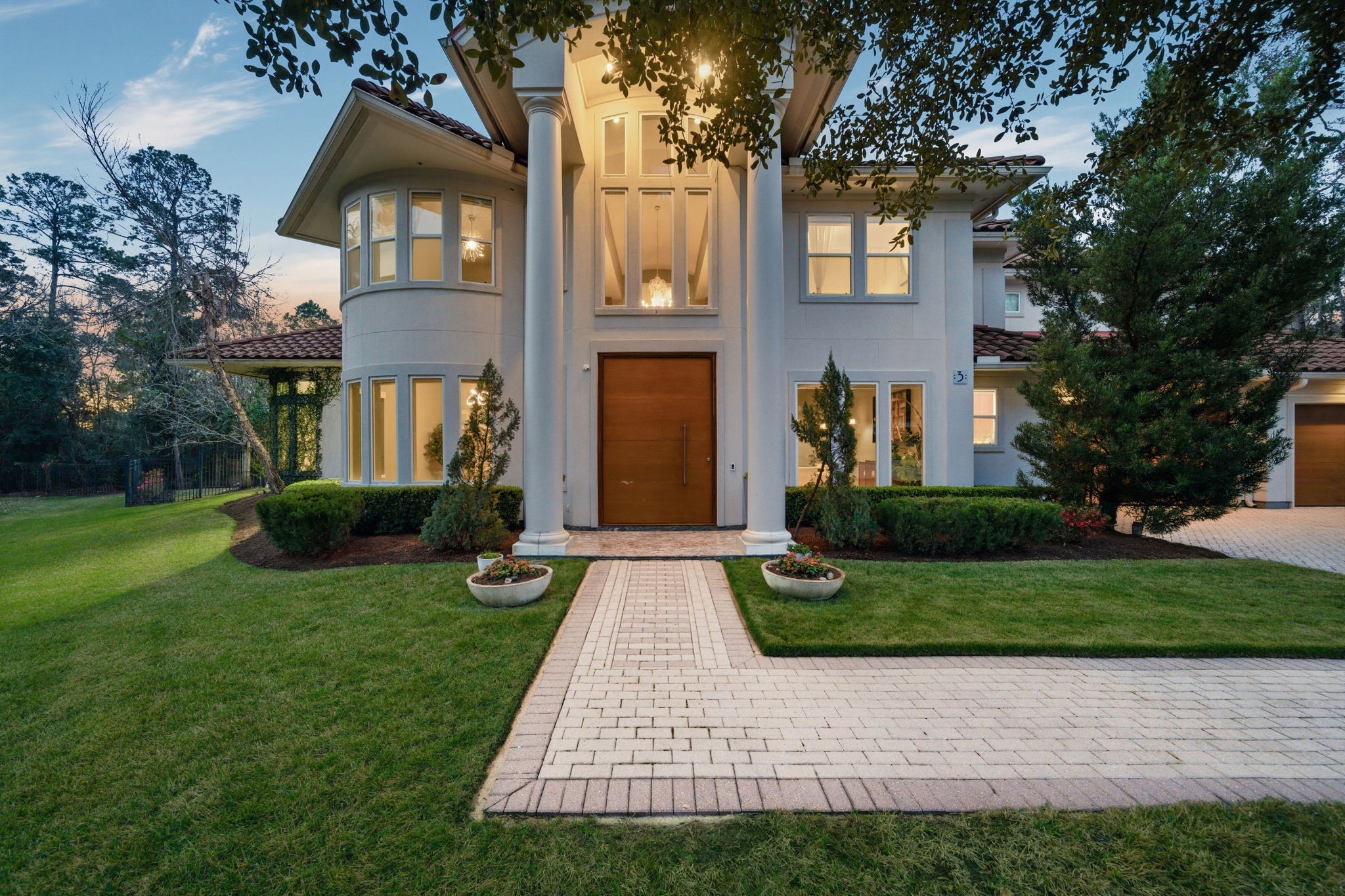 3 Farington Way The Woodlands, TX 77382 - Photo 6 of 49 a front view of a house with yard